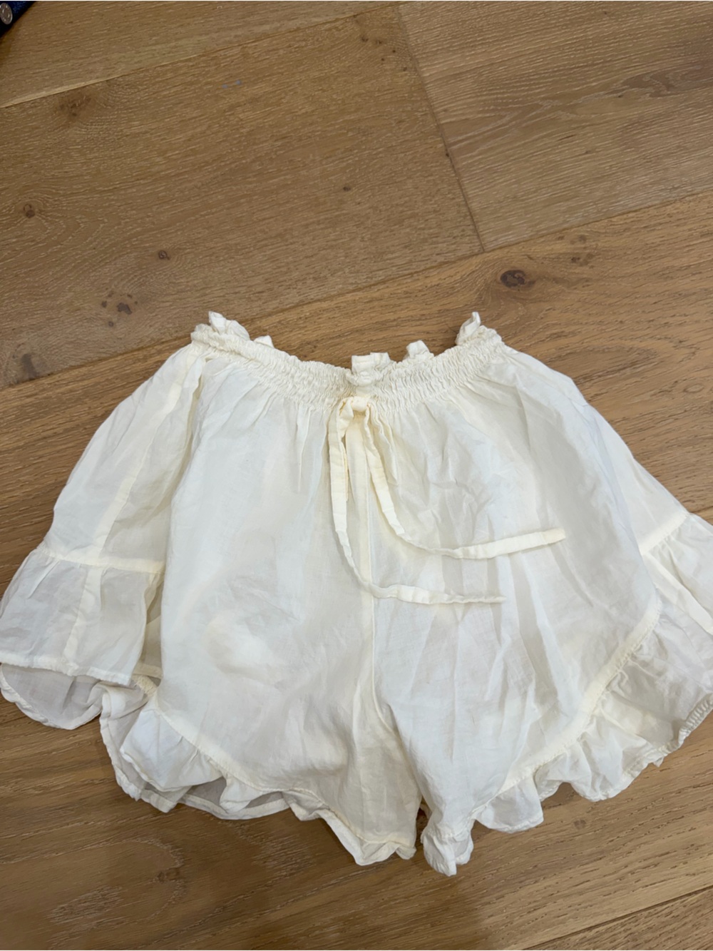 Montce Cream Ruffle Hem Lightweight Shorts